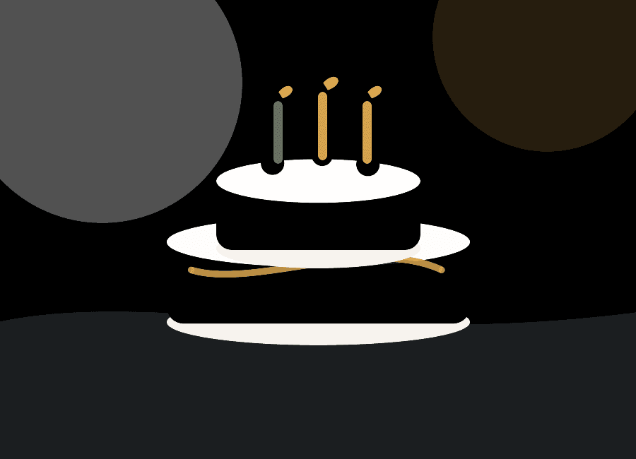 Decorated birthday cake with candles